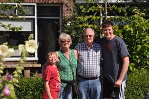 Ethan, Grandma& Grandpa, Ben in front of Visser home in Parrega